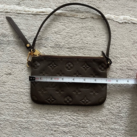 Like ๐ Louis Vuitton Empriente Citadine leather muted taupe mini pouch wristlet - Picture 13 of 17